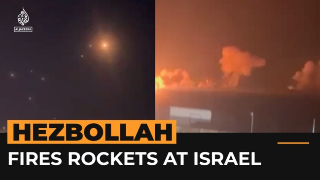 Hezbollah fires dozens of rockets into Israel