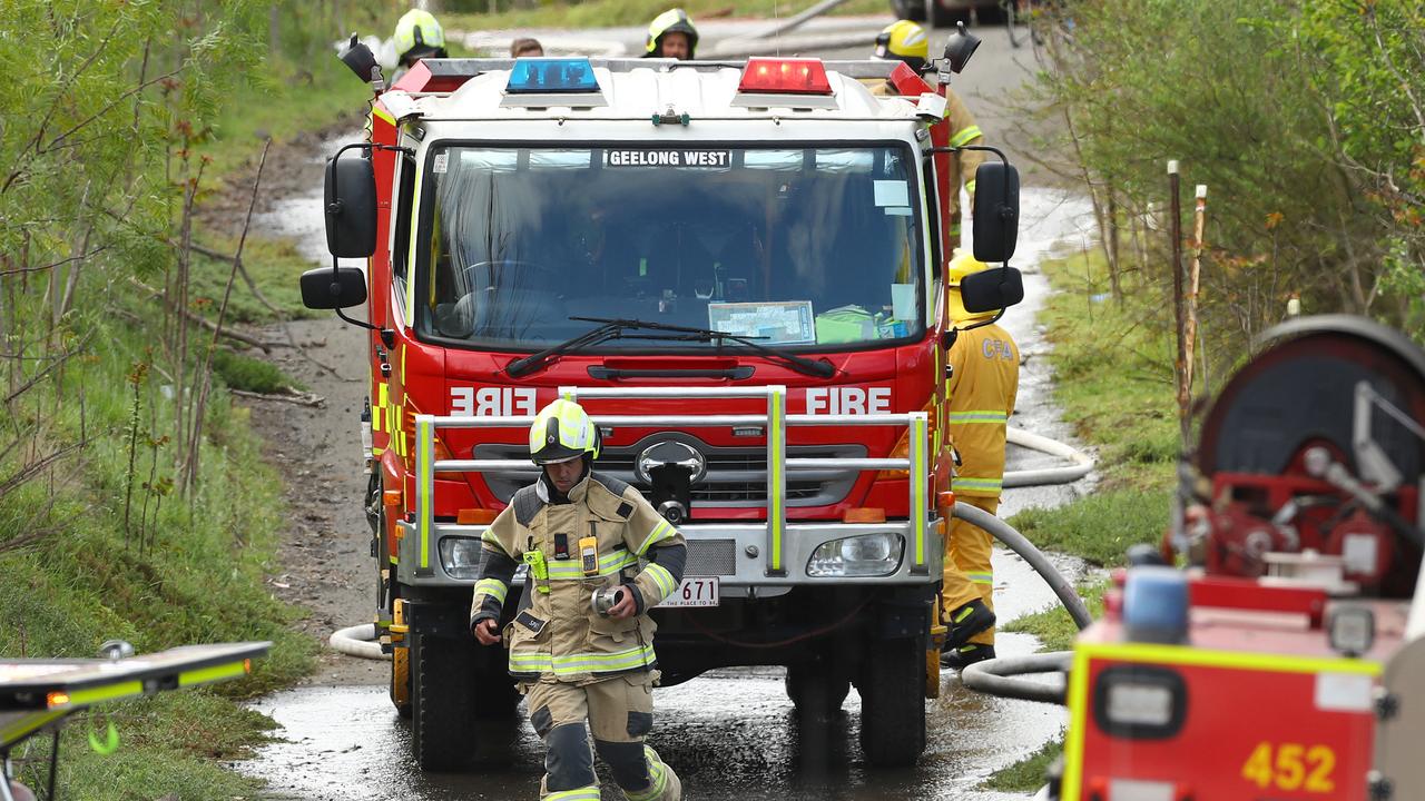 Emergency services respond to a house on fire near the Moorabool River at Fyansford. Picture: Alison Wynd