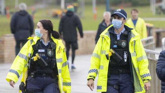 Police patrol Bronte Beach on Saturday to enforce lockdown restrictions. Picture: Jenny Evans/Getty Images