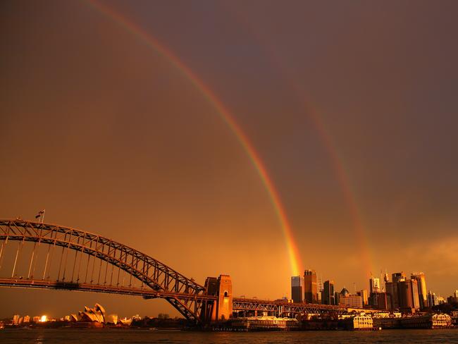 Double rainbows are rare, experts say, and the second one is a mirror image of the first.