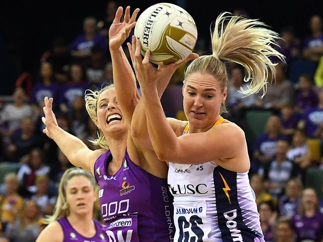 Laura Geitz (left) and Caitlin Bassett clash in a game defined by desperation. Picture: AAP