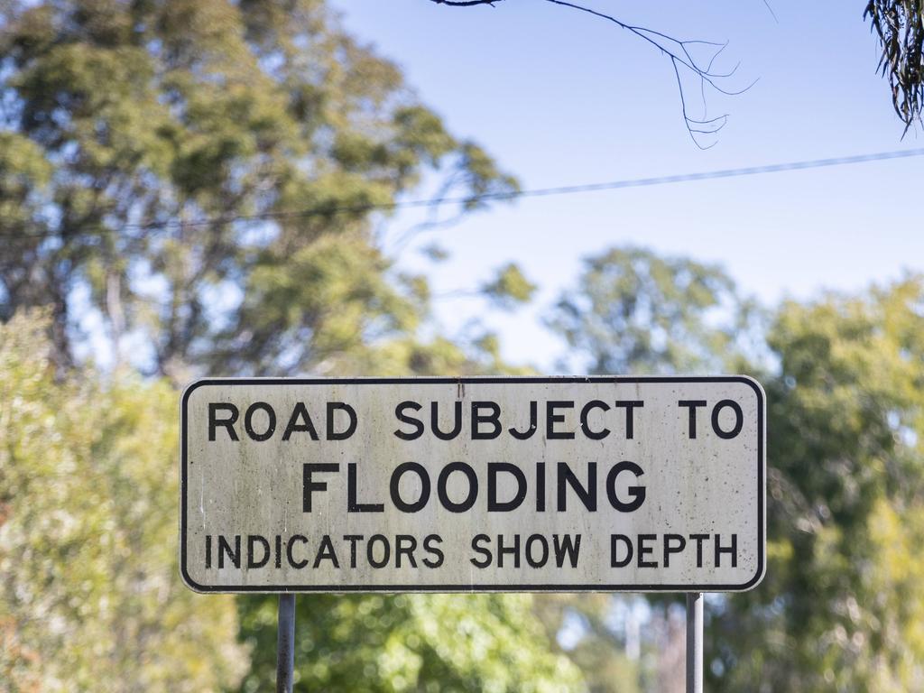 Road Subject to Flooding sign in Rocklea, on Tramore Street. Picture : Matthew Poon.