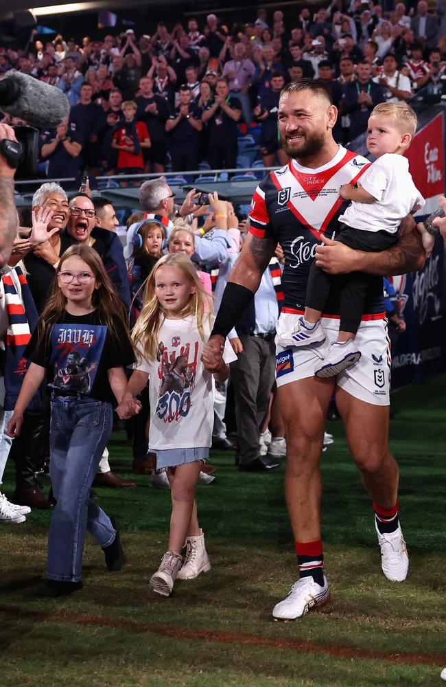 Jared Waerea-Hargreaves of the Roosters walks out onto the field with his children. (Photo by Cameron Spencer/Getty Images)