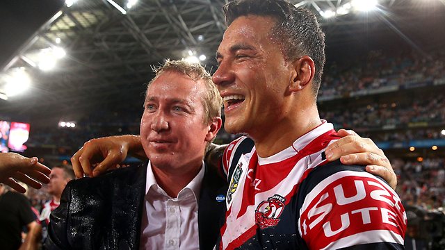 Sonny Bill Williams and Trent Robinson celebrate after the Roosters win the Grand Final.