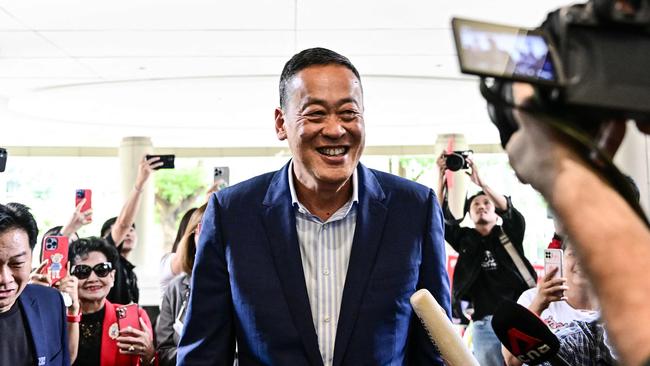 Srettha Thavisin arrives at party headquarters in Bangkok shortly before being elected prime minister. Picture: AFP)