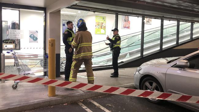 A car crashed through the glass sliding doors at Glenorchy Plaza. Photo: Jarrod Lawler