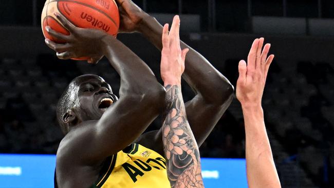 Australia's Thon Maker made his presence felt, with back-to-back rejections in the first quarter. Picture: AFP.