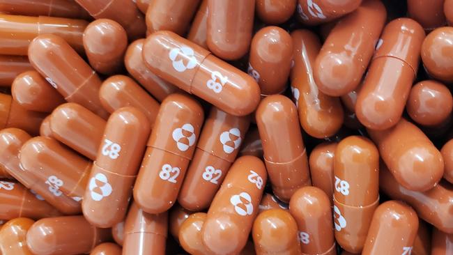(FILES) This handout photo obtained May 26, 2021, courtesy of Pharmaceutical company Merck shows capsules of the experimental antiviral drug Molnupiravir. - Merck said on October 1, 2021, it will seek authorization in the US for molnupiravir for Covid-19, after the pill showed 