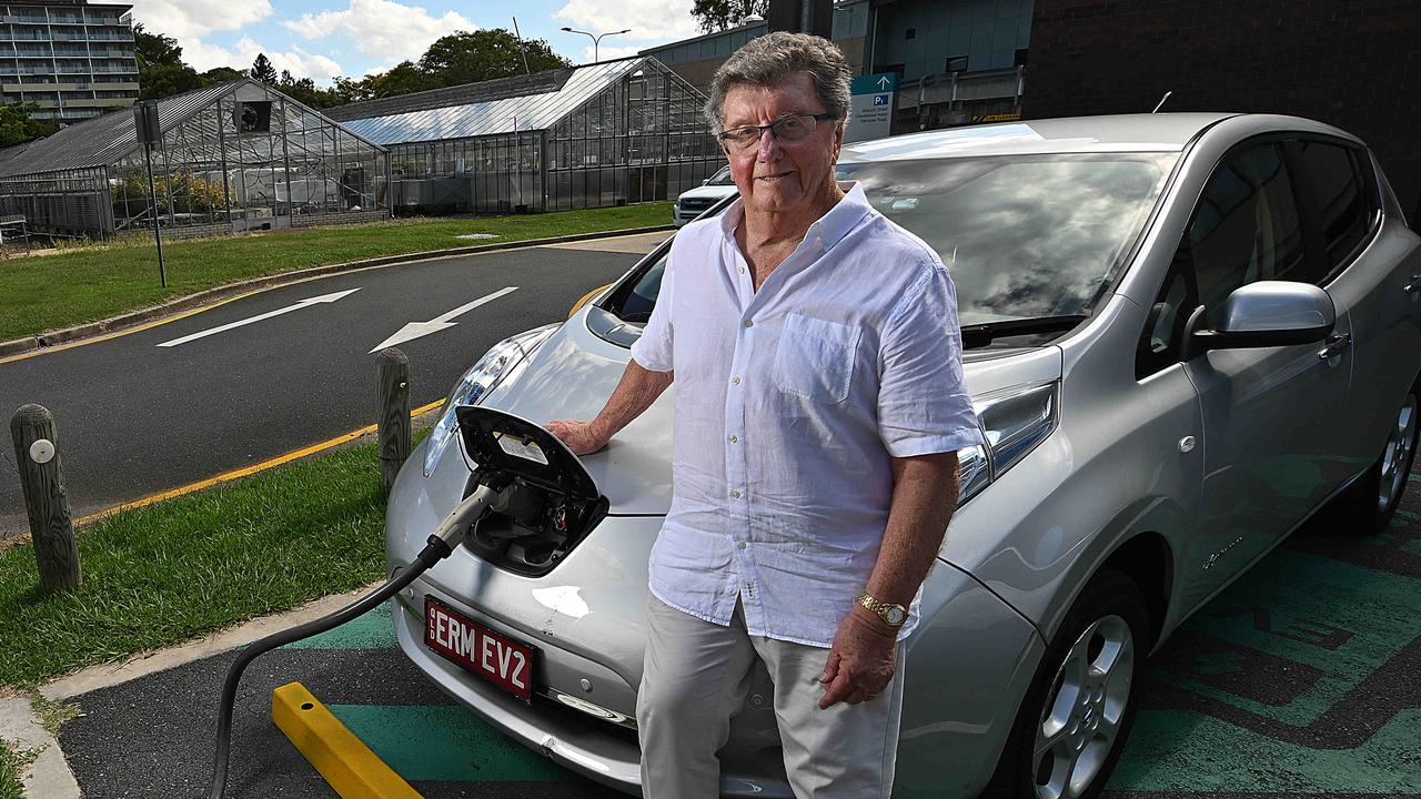 Trevor St Baker recharges his 4 year old Nissan Leaf with one of his company’s charging stations near his home in St Lucia, Brisbane. Trevor owns one of the biggest charging station companies in the world. Picture: Lyndon Mechielsen