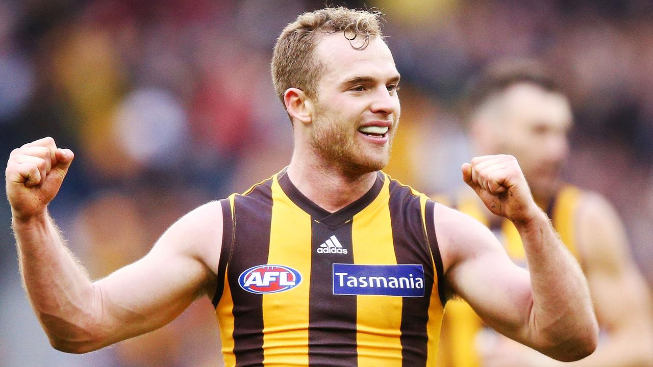 Tom Mitchell celebrates a goal against Essendon earlier this year.