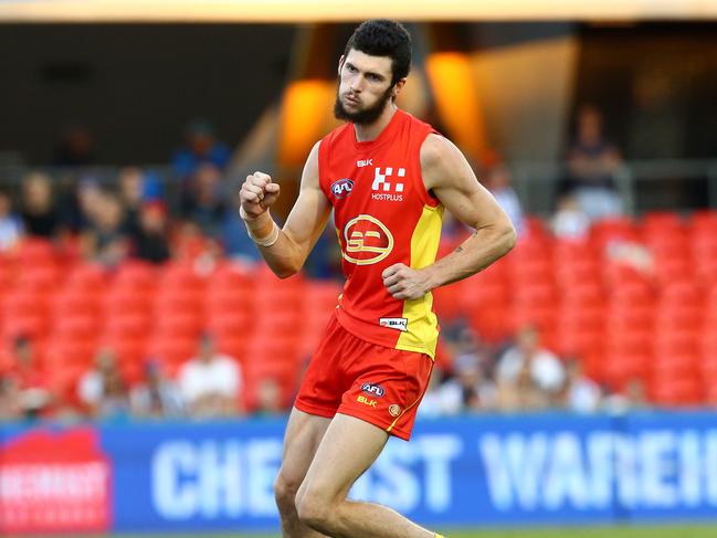 Jarrad Grant kicks his first goal during the Round 5 AFL game between the Gold Coast Suns and North Melbourne from Metricon Stadium, Carrara. Pics Adam Head