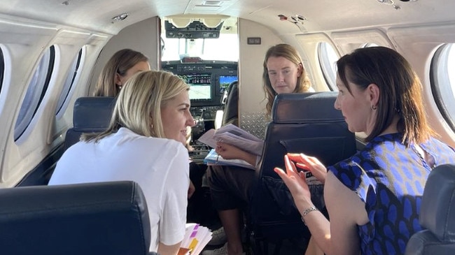 Health Minister Shannon Fentiman is briefed by a Queensland Health staffer on her way to Gladstone. Picture: Tim Arvier