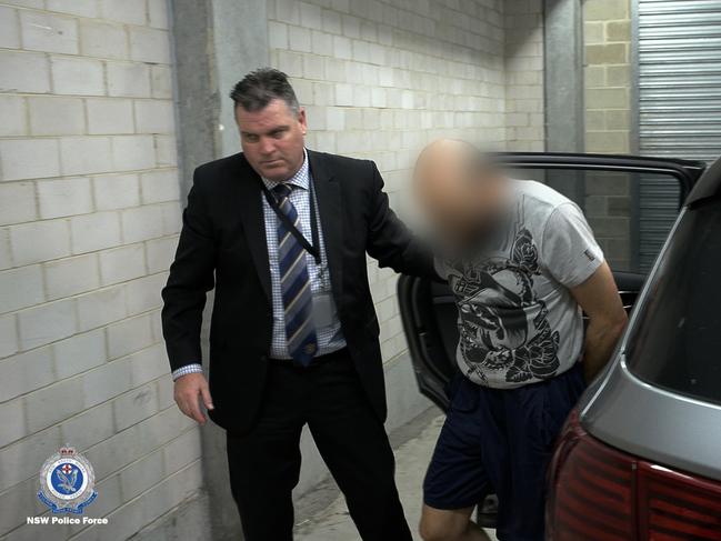 Homicide Squad detectives arresting Vincent Lambroglou. Picture: NSW Police