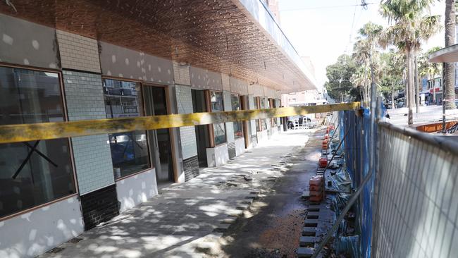 Hoarding has been up at on the Corso, Manly since 2018. Picture: John Grainger