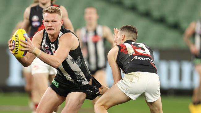 Adam Treloar tries to break clear against Essendon last weekend. Picture: Michael Klein