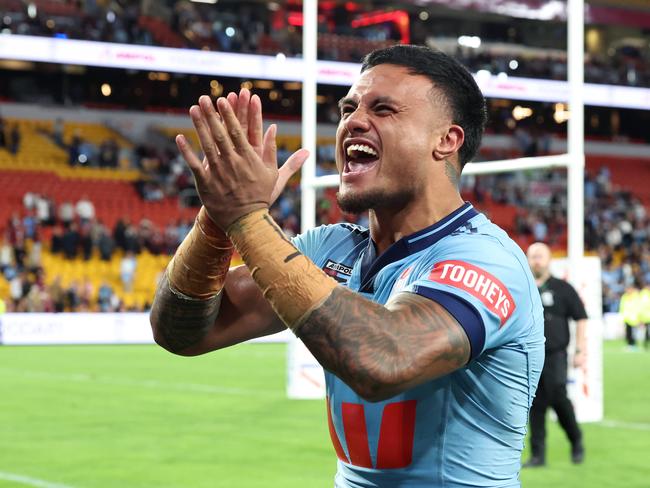 Spencer Leniu shows his appreciation to the Queensland crowd after Origin I in Brisbane. Picture: Adam Head
