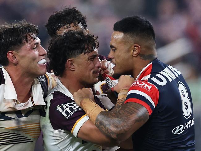 LAS VEGAS, NEVADA - MARCH 02: SpencerÃÂ Leniu (r) of the Roosters exchanges heated words with KotoniÃÂ Staggs of the Broncos during the round one NRL match between Sydney Roosters and Brisbane Broncos at Allegiant Stadium, on March 02, 2024, in Las Vegas, Nevada. (Photo by Ezra Shaw/Getty Images)