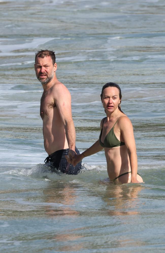 Toni Collette’s husband Dave Galafassi with another woman at Manly beach. Picture: Matrix