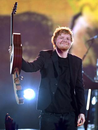 Ed Sheeran acknowledges the applause onstage at the 2017 iHeartRadio Music Awards in March 5. Picture: Kevin Winter