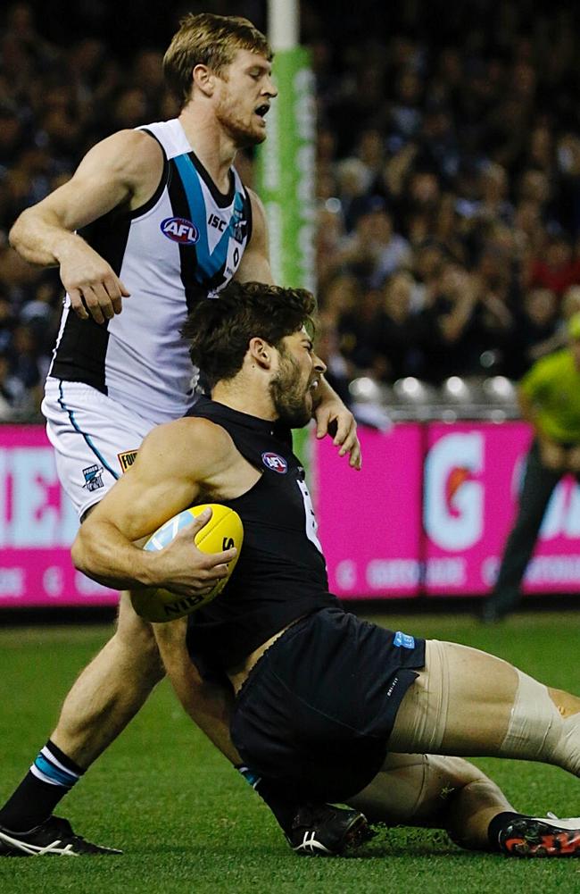 Carlton forward Levi Casboult falls awkwardly taking his mark. Picture: George Salpigtidis
