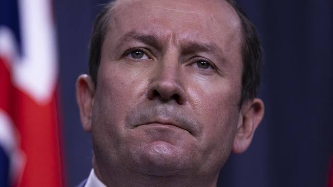 PERTH, AUSTRALIA - JUNE 29: West Australian Premier Mark McGowan speaks to media at Dumas House on June 29, 2021 in Perth, Australia. Lockdown restrictions have come into effect across the Perth and Peel regions for the next four days, following the confirmation of new community COVID-19 cases linked to the highly contagious Delta variant of the coronavirus. From midnight, residents in the Perth and Peel regions are only permitted to leave their homes for essential reasons, including purchasing essential goods, receiving medical care, or caring for the vulnerable. People may leave home to get vaccinated or to exercise within a 5-kilometre radius of their home. Weddings are restricted to five people, funerals to 10 people while gyms, beauty and hair salons, casinos and nightclubs must close. (Photo by Matt Jelonek/Getty Images)