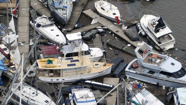 Ten year anniversary of Cyclone Yasi. Severe Tropical Cyclone Yasi 2011. Port Hinchinbrook aerial view of luxury yachts and boats that bore the brunt of the destructive winds and storm surge. Picture: Evan Morgan
