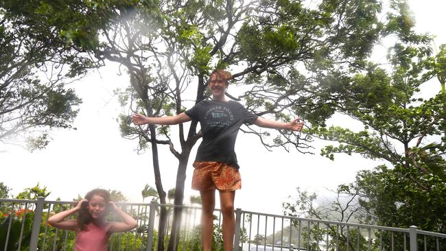 Port Douglas local Jax Diball, 13, enjoys the novelty of strong winds on top of Flagstaff Hill. Picture: Peter Carruthers