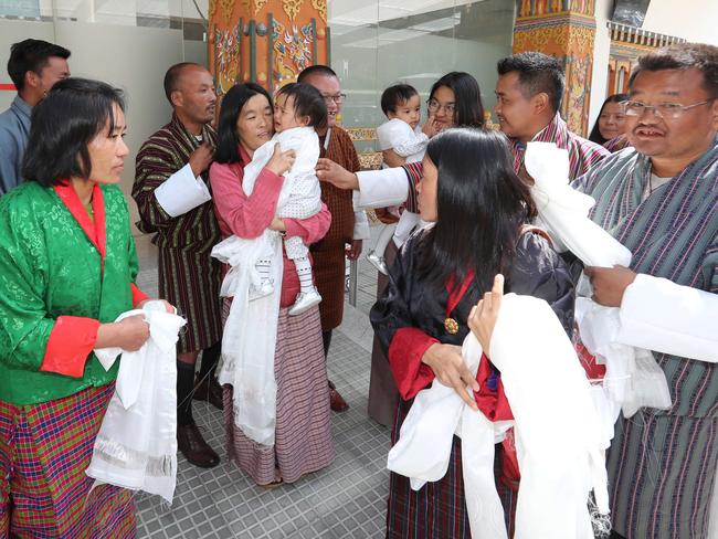 Nima and Dawa Pelden return home to Bhutan, where they are reunited with the rest of their family. Picture: Alex Coppel