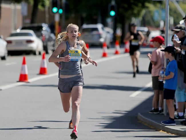 Women's 6km event winner Mel Daniels crosses the finish line in the Race to the Taste. Picture: PATRICK GEE
