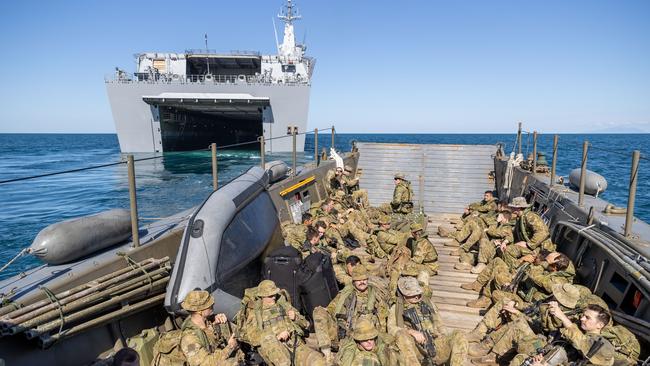 Soldiers from 2nd Battalion, the Royal Australian Regiment, on-board an Australian Army LCM-8 Landing Craft depart HMAS Canberra for beach landing serials during Exercise Sea Explorer, Cowley Beach, Queensland. Picture: Supplied