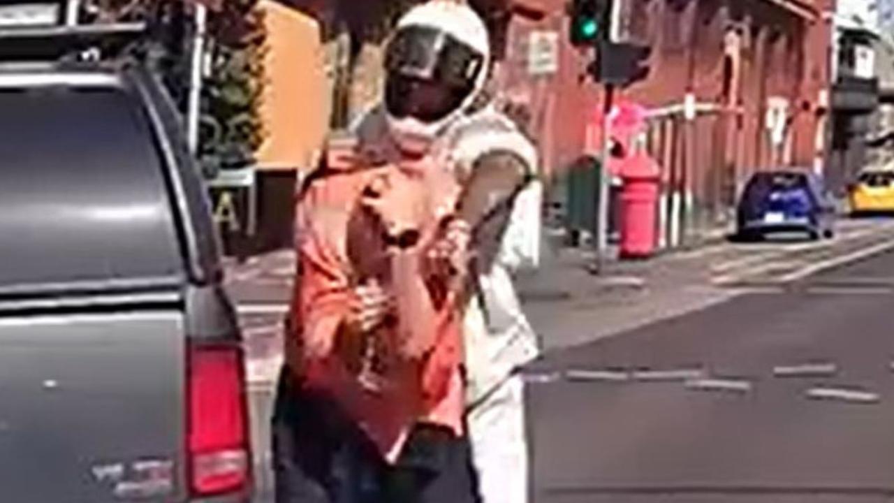 Wild moment scooter rider erupts at ute driver in Port Melbourne