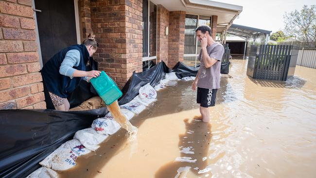 Becky and Howard O'Sullivan during the floods. Picture: Jason Edwards