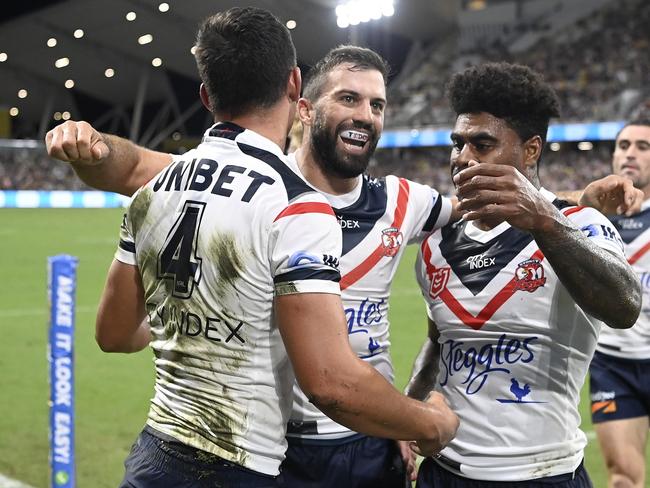 TOWNSVILLE, AUSTRALIA - APRIL 02:  Joseph Manu of the Roosters celebrates after scoring a try  during the round four NRL match between the North Queensland Cowboys and the Sydney Roosters at Qld Country Bank Stadium, on April 02, 2022, in Townsville, Australia. (Photo by Ian Hitchcock/Getty Images)