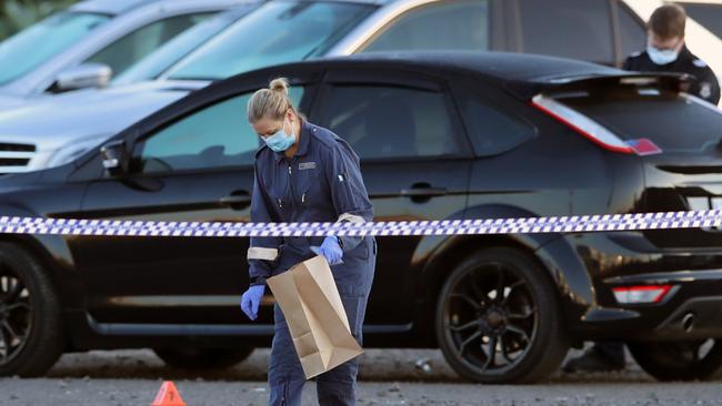 Police at the scene of a drive-by shooting in Ravenhall. Picture: David Crosling