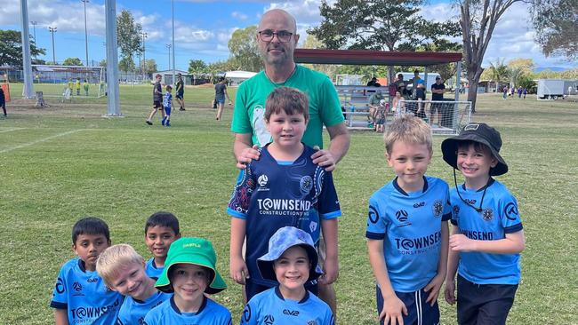 Estates FC under-7 players Harshil Singh, Hitansh Singh, Harlan Lawson, Emmi Tucker, Arlo Miller, Adam Holdsworth, Oscar Elizalde and Oliver Fegan celebrate being named Football Queensland Townsville Team of the Week.