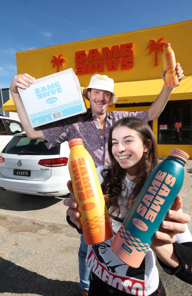 A bright-yellow building at Miami will be home to a new water bar. SameSame founder Charlie Beauchamp said they are looking to open their headquarters in late September. Charlie Beauchamp and Executive Assistant Ava McCarthy show off their product in front of their new store. Picture Glenn Hampson