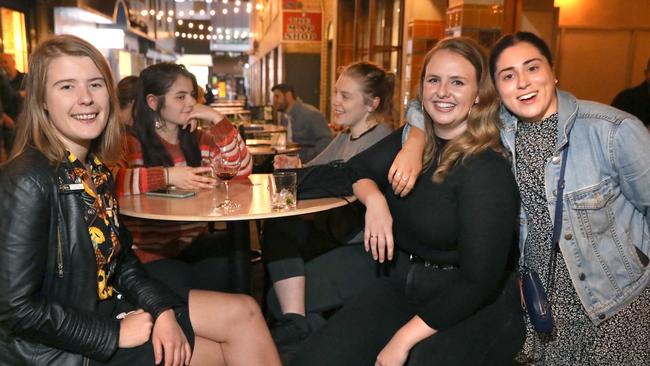 Vanessa Rech, Maeve Marryat and Chloe Borrelli enjoy a night out in Peel St before the start of the pandemic. Picture: Dean Martin