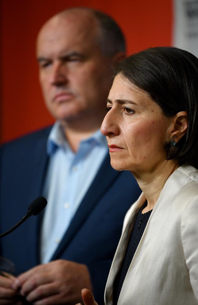 NSW Minister for Police and Emergency Services David Elliott (left) and NSW Premier Gladys Berejiklian during a press conference at NSW Rural Fire Service headquarters in Sydney on Friday. Picture: AAP