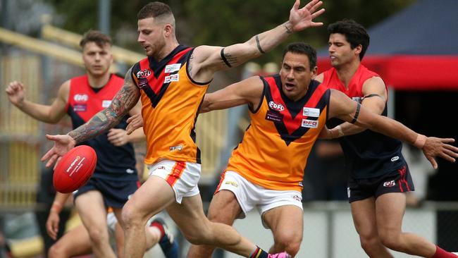 Victor Micallef sends East Keilor forward. Picture: Hamish Blair