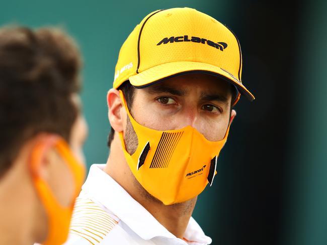 BAHRAIN, BAHRAIN - MARCH 26: Daniel Ricciardo of Australia and McLaren F1 and Lando Norris of Great Britain and McLaren F1 ta during practice ahead of the F1 Grand Prix of Bahrain at Bahrain International Circuit on March 26, 2021 in Bahrain, Bahrain. (Photo by Mark Thompson/Getty Images)