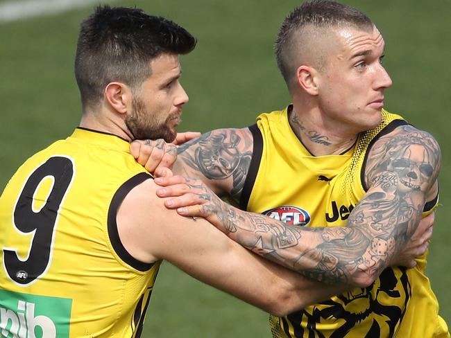 MELBOURNE, AUSTRALIA - SEPTEMBER 20:  Trent Cotchin of the Tigers and Dustin Martin of the Tigers compete for the ball during a Richmond Tigers AFL training session at Punt Road Oval on September 20, 2018 in Melbourne, Australia.  (Photo by Scott Barbour/Getty Images)