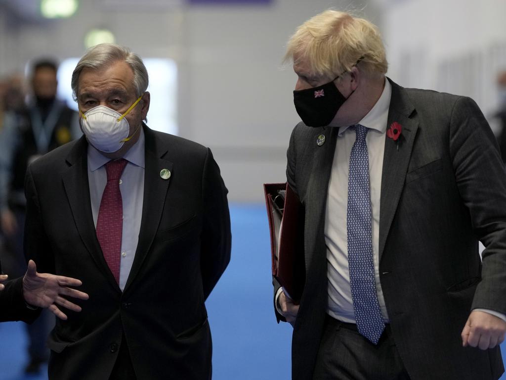 British Prime Minister Boris Johnson (r) arrives with UN Secretary-General Antonio Guterres at COP26. Picture: Alastair Grant – WPA Pool/Getty Images