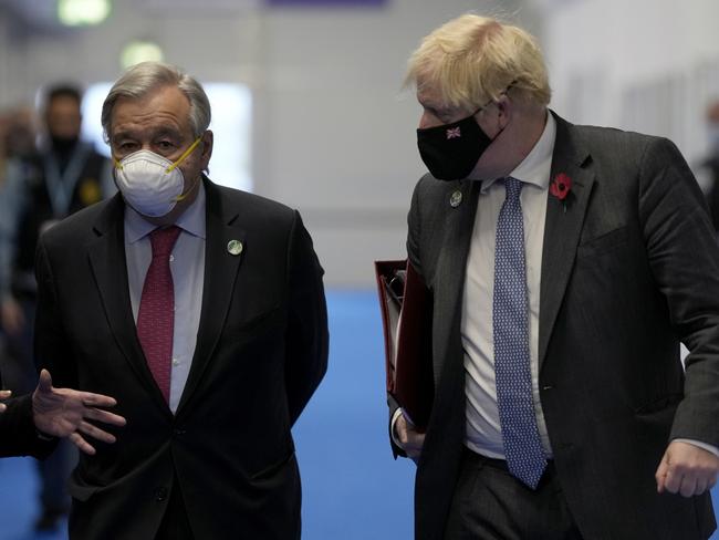 British Prime Minister Boris Johnson (r) arrives with UN Secretary-General Antonio Guterres at COP26. Picture: Alastair Grant – WPA Pool/Getty Images