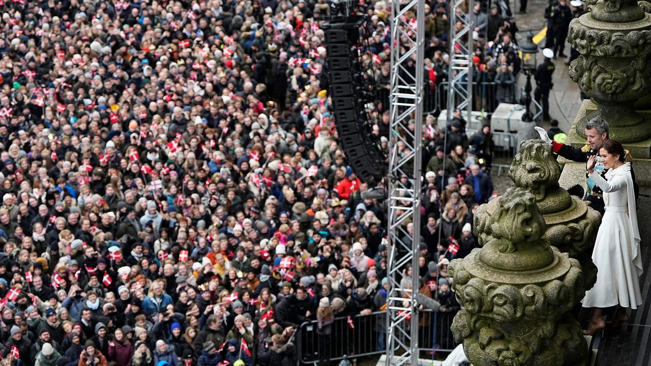 King Frederik X of Denmark and Queen Mary of Denmark (R) wave to the crowd from the balcony of Christiansborg Palace in Copenhagen. Picture: AFP / Denmark OUT