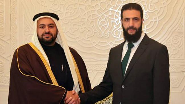 Qatar's Minister of State Mohammed bin Abdulaziz al-Khulaifi with HTS leader Ahmed al-Sharaa. Picture: AFP Photo/HO/SANA