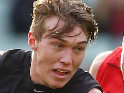 MELBOURNE, AUSTRALIA - AUGUST 23: Patrick Cripps of the Blues is chased by Bernie Vince of the Demons during the 2015 AFL round 21 match between the Carlton Blues and the Melbourne Demons at the Melbourne Cricket Ground, Melbourne, Australia on August 23, 2015. (Photo by Michael Willson/AFL Media/Getty Images)