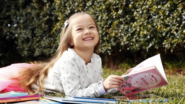 Sienna Lee, 6, loves reading. Picture: Tim Hunter