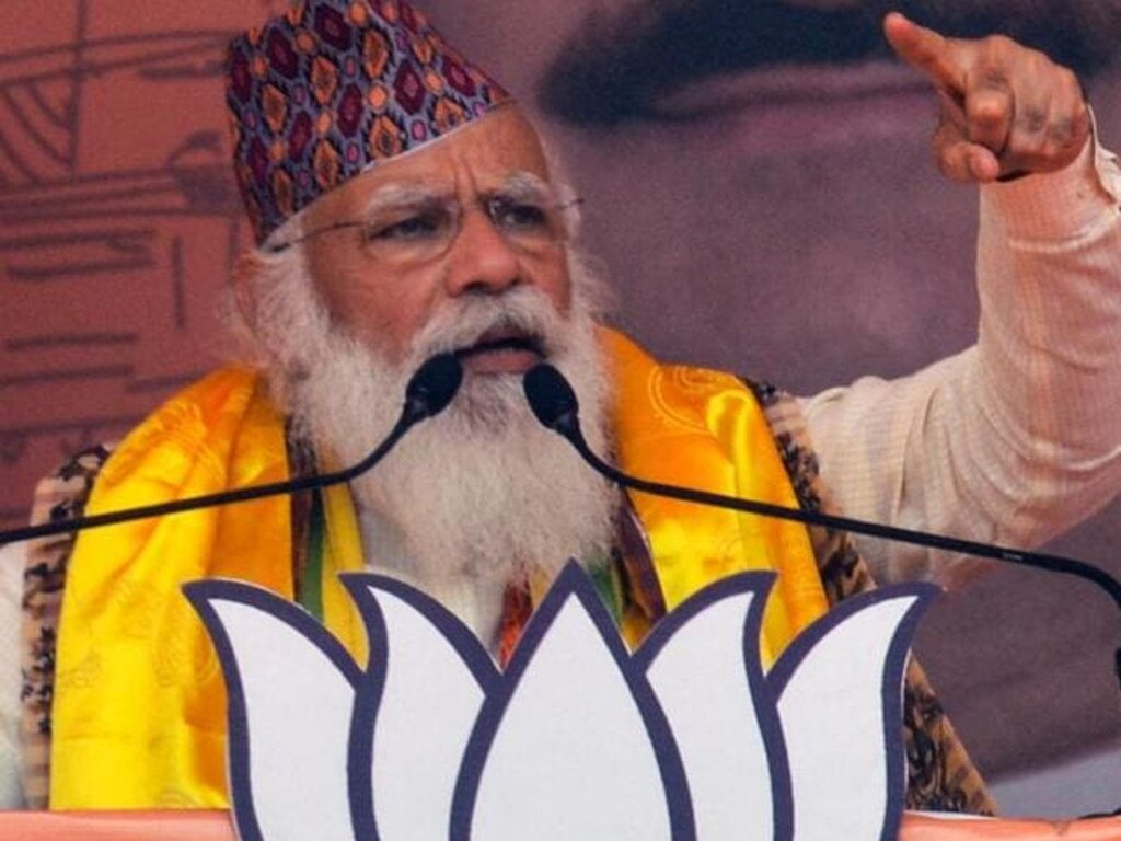 Prime Minister Narendra Modi has faced strong criticism after his party tweeted photos of a giant political rally midway through the latest wave.