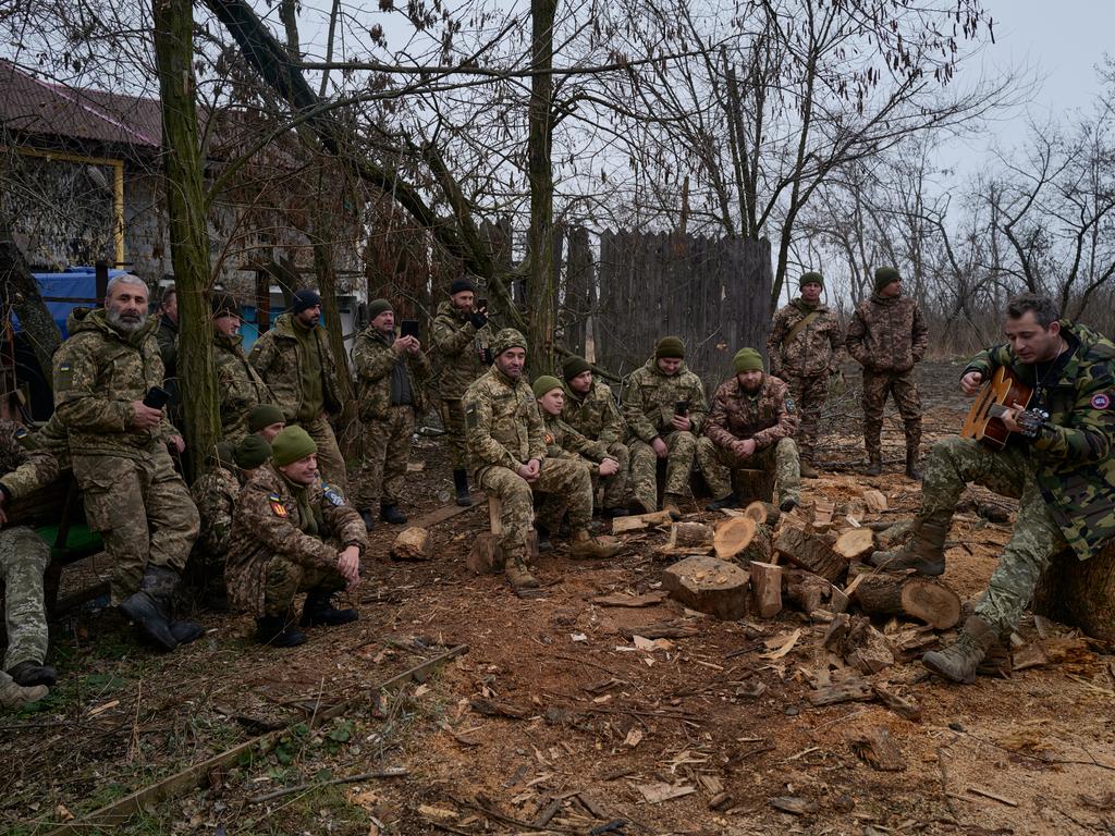 Ukrainian singer Kolia Cerga performs for Ukrainian soldiers of the 59th brigade near the frontline on Christine. Picture: Pierre Crom/Getty Images