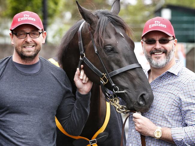 David Henderson (right) and his brother Andrew Henderson with their horse Excess Knowledge which will start in tomorrows Melbourne Cup at Gai Waterhouses Flemington stables . Pic: Michael Klein